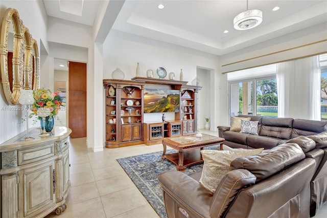 5474 S Sterling Ranch Cir, Davie, FL 33314 - living room featuring light tile patterned floors, recessed lighting, and a tray ceiling