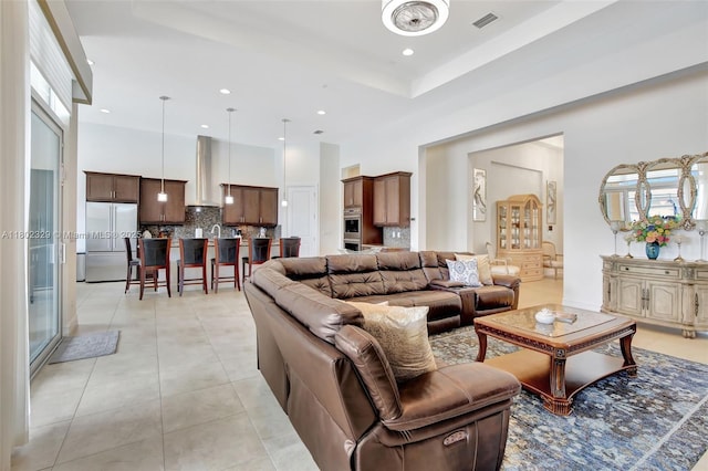 5474 S Sterling Ranch Cir, Davie, FL 33314 - living area featuring light tile patterned floors, recessed lighting, and a high ceiling