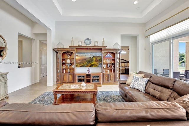 5474 S Sterling Ranch Cir, Davie, FL 33314 - living room with light tile patterned floors and a raised ceiling