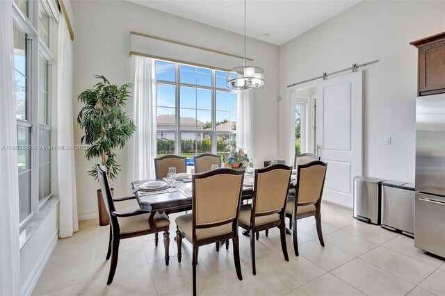 5474 S Sterling Ranch Cir, Davie, FL 33314 - dining room featuring light tile patterned floors and a chandelier