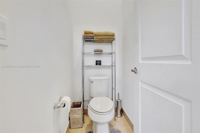 5474 S Sterling Ranch Cir, Davie, FL 33314 - bathroom featuring baseboards and toilet