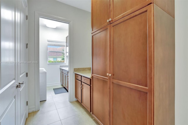 5474 S Sterling Ranch Cir, Davie, FL 33314 - bathroom featuring tile patterned flooring and washer / clothes dryer