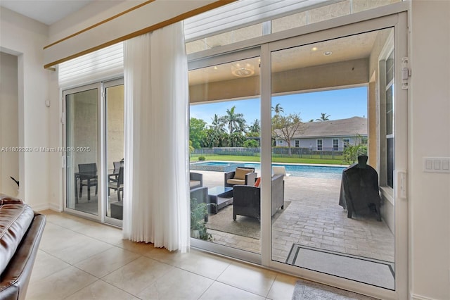 5474 S Sterling Ranch Cir, Davie, FL 33314 - doorway with plenty of natural light and tile patterned floors