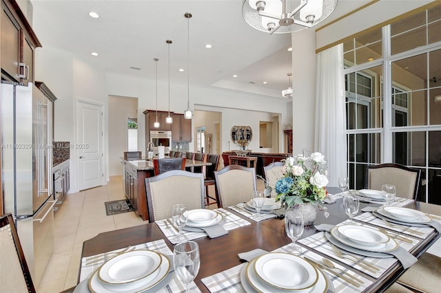 5474 S Sterling Ranch Cir, Davie, FL 33314 - dining room with recessed lighting, light tile patterned flooring, and a chandelier