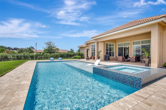 5474 S Sterling Ranch Cir, Davie, FL 33314 - view of swimming pool featuring an in-ground hot tub, a patio area, and an outdoor hangout area