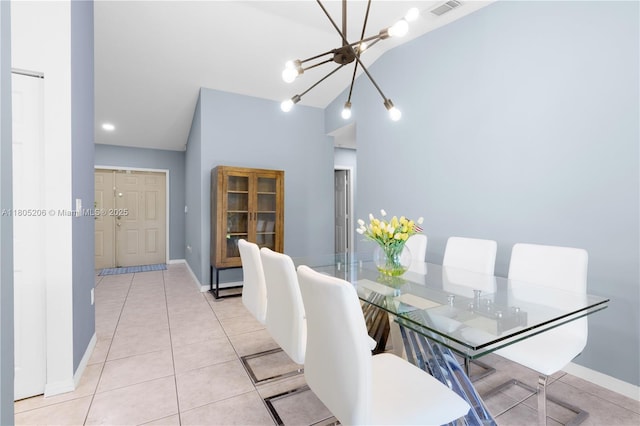 22041 SW 127th Ct, Miami, FL 33170 - dining space with a chandelier, light tile patterned flooring, baseboards, and lofted ceiling