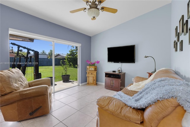 22041 SW 127th Ct, Miami, FL 33170 - living area featuring light tile patterned floors, ceiling fan, baseboards, and vaulted ceiling