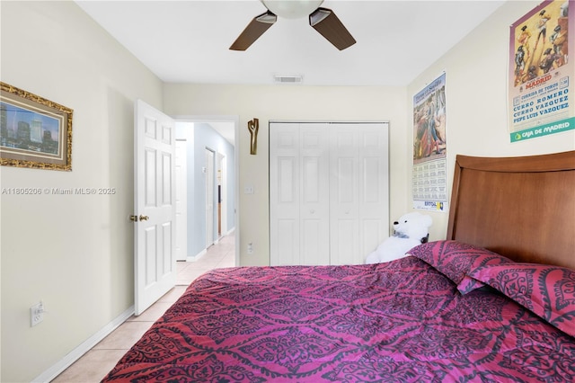22041 SW 127th Ct, Miami, FL 33170 - bedroom with light tile patterned floors, baseboards, a ceiling fan, and a closet
