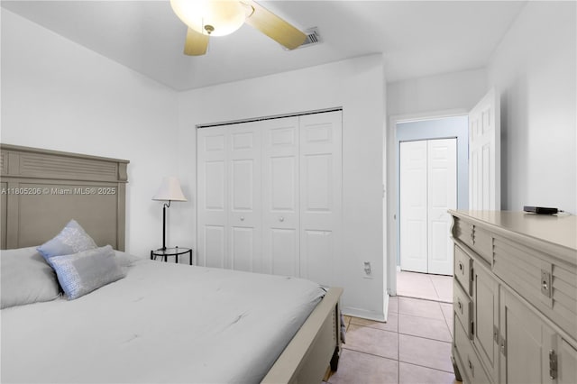 22041 SW 127th Ct, Miami, FL 33170 - bedroom featuring a closet, light tile patterned floors, and a ceiling fan