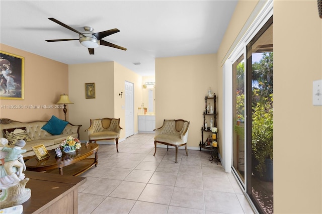 22041 SW 127th Ct, Miami, FL 33170 - living area with light tile patterned floors, ceiling fan, and baseboards