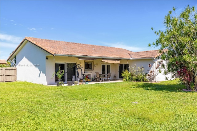 22041 SW 127th Ct, Miami, FL 33170 - rear view of house with stucco siding, a patio area, and a tiled roof