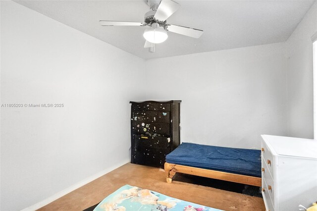 10772 La Placida Dr Unit 7-203, Coral Springs, FL 33065 - bedroom with light colored carpet, baseboards, and a ceiling fan