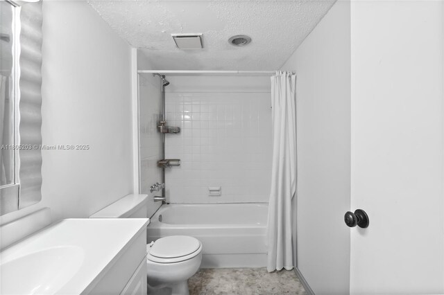 10772 La Placida Dr Unit 7-203, Coral Springs, FL 33065 - full bathroom with a textured ceiling, vanity, toilet, and shower / bath combo