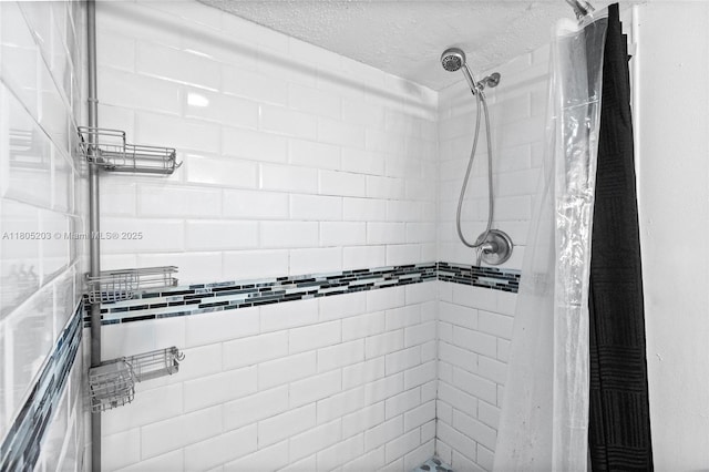 10772 La Placida Dr Unit 7-203, Coral Springs, FL 33065 - full bath with a tile shower and a textured ceiling