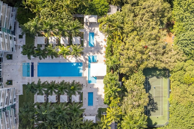 drone / aerial view of a pool