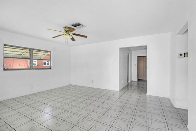 7612 NW 68th Ave, Tamarac, FL 33321 - unfurnished room featuring ceiling fan and light floors