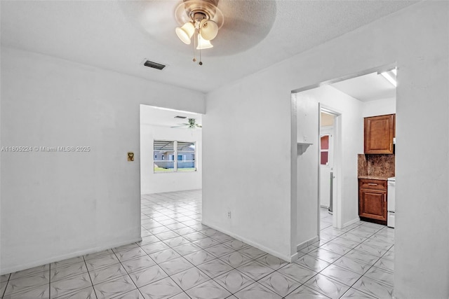 7612 NW 68th Ave, Tamarac, FL 33321 - empty room featuring ceiling fan and baseboards