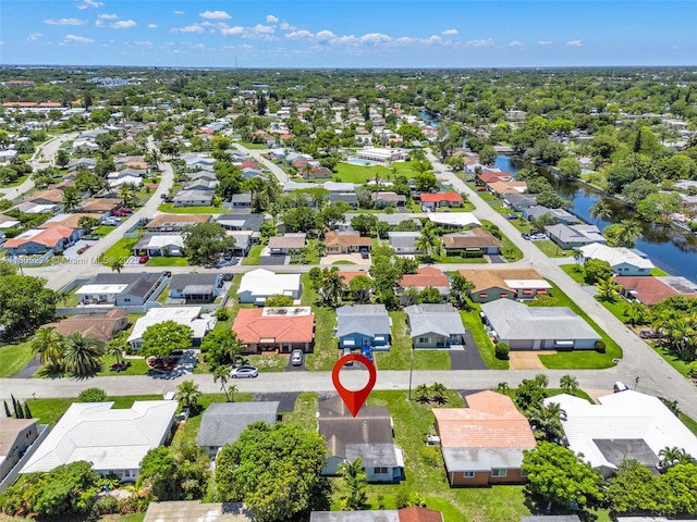 7612 NW 68th Ave, Tamarac, FL 33321 - aerial perspective of suburban area with a nearby body of water