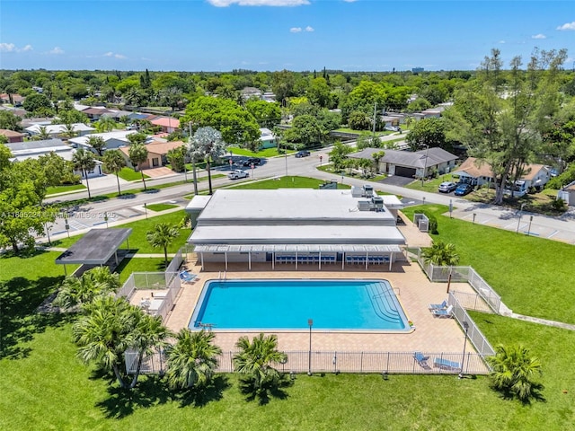7612 NW 68th Ave, Tamarac, FL 33321 - view of pool featuring fence and a residential view