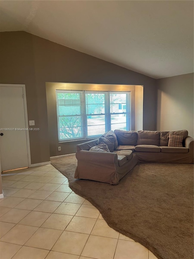 8631 Bridle Path Ct, Davie, FL 33328 - living room with lofted ceiling, light tile patterned floors, and baseboards
