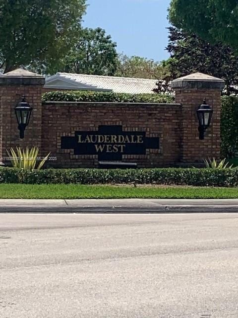view of community sign