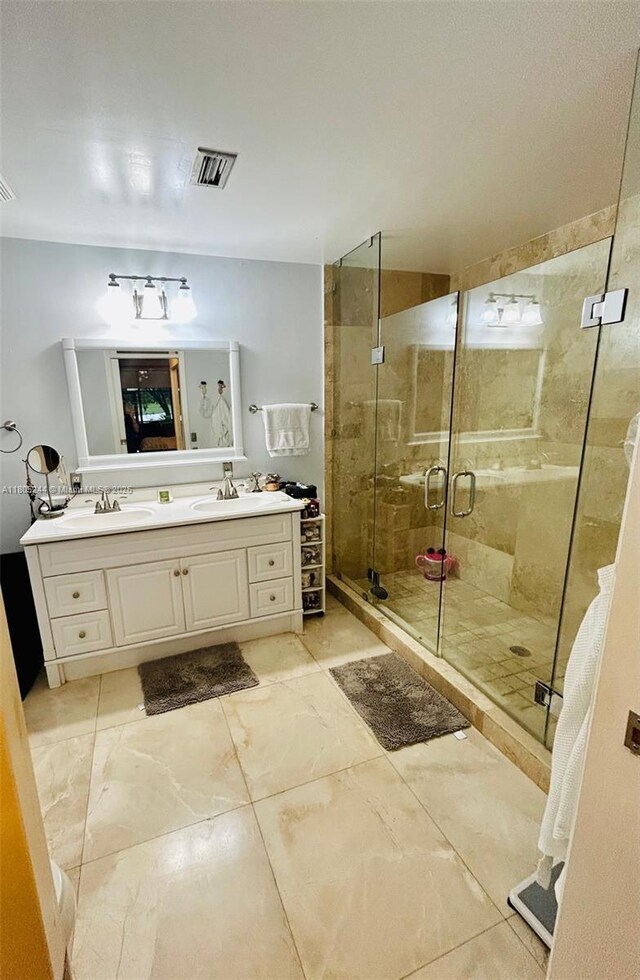 3480 Torremolinos Ave Unit A-33, Doral, FL 33178 - full bathroom featuring a stall shower and double vanity