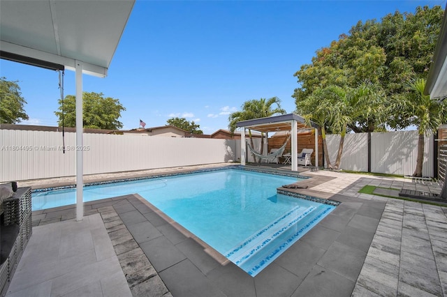 17930 NW 85th Ave, Hialeah, FL 33015 - view of swimming pool with a patio area, a gazebo, and a fenced backyard