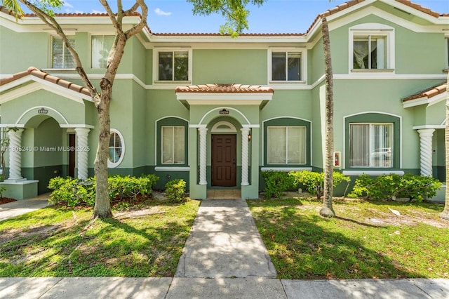 1458 SE 24th Ct Unit 353, Homestead, FL 33035 - townhome / multi-family property featuring a tiled roof and stucco siding