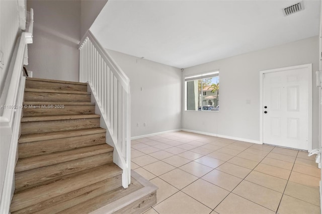 1458 SE 24th Ct Unit 353, Homestead, FL 33035 - stairs featuring tile patterned floors and baseboards