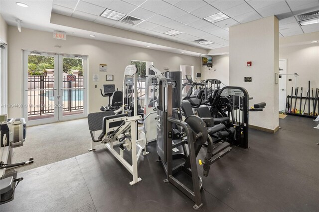 9021 SW 94th St Unit 306, Miami, FL 33176 - gym with a paneled ceiling and french doors