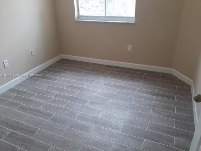 2731 SE 17th Ave Unit 207, Homestead, FL 33035 - empty room with baseboards