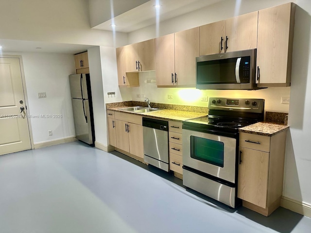 111 E Flagler Unit 702, Miami, FL 33131 - kitchen featuring stainless steel appliances, a sink, light brown cabinets, baseboards, and concrete floors