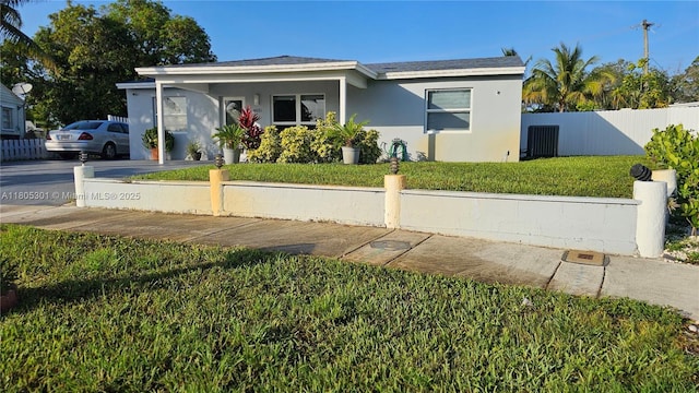 4651 SW 19th St, Fort Lauderdale, FL 33317 - view of front facade with stucco siding and central AC unit