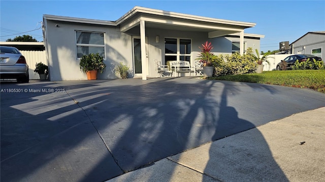 4651 SW 19th St, Fort Lauderdale, FL 33317 - view of front of house featuring stucco siding