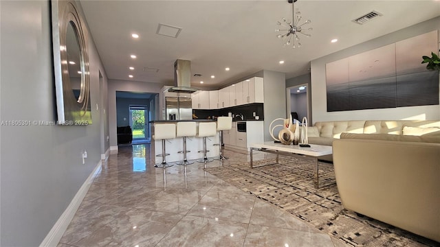4651 SW 19th St, Fort Lauderdale, FL 33317 - living area with baseboards, light marble finish floors, and recessed lighting