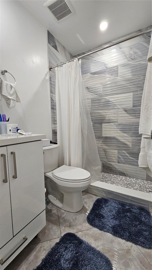 4651 SW 19th St, Fort Lauderdale, FL 33317 - bathroom featuring toilet, a tile shower, and vanity