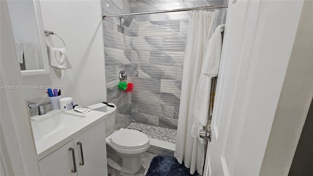 4651 SW 19th St, Fort Lauderdale, FL 33317 - bathroom featuring vanity, tiled shower, and toilet
