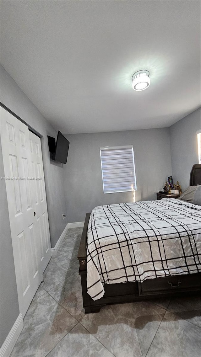 4651 SW 19th St, Fort Lauderdale, FL 33317 - bedroom featuring baseboards and a closet