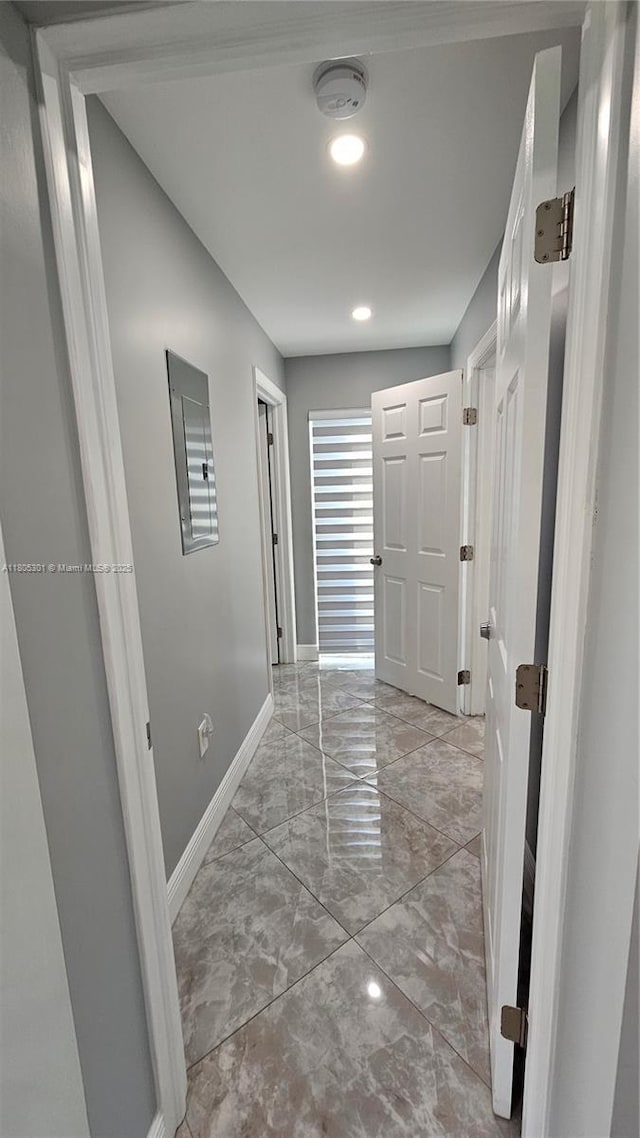 4651 SW 19th St, Fort Lauderdale, FL 33317 - hall with light marble finish flooring, baseboards, and recessed lighting