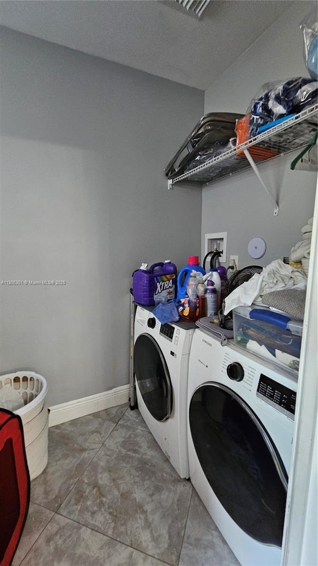 4651 SW 19th St, Fort Lauderdale, FL 33317 - laundry area featuring washing machine and clothes dryer and baseboards