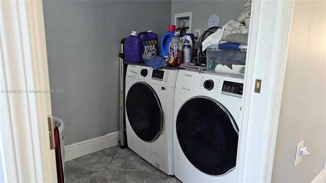 4651 SW 19th St, Fort Lauderdale, FL 33317 - laundry area featuring washing machine and clothes dryer, baseboards, and marble finish flooring