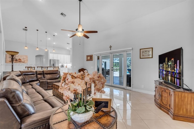 living area featuring high vaulted ceiling, a ceiling fan, light tile patterned flooring, recessed lighting, and baseboards