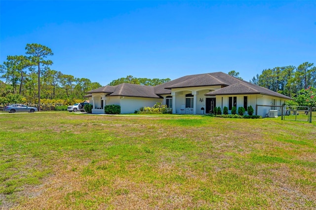 single story home featuring cooling unit