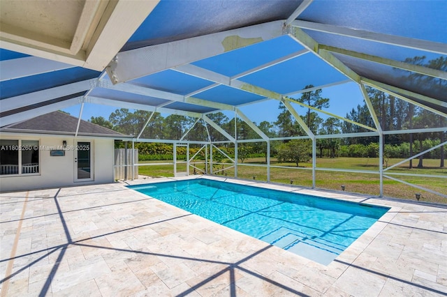 swimming pool featuring a patio and a lanai
