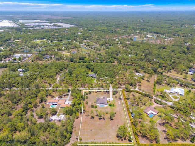 drone / aerial view of a heavily wooded area