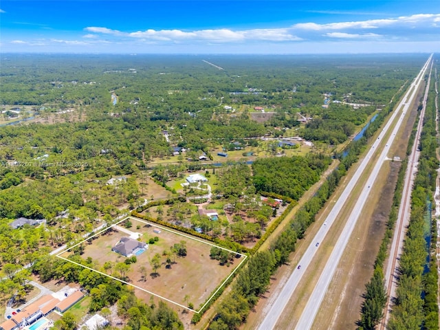 aerial overview of property's location with property parcel outlined