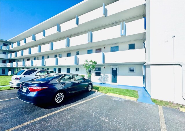 1701 NE 191st St Unit A108, Miami, FL 33179 - view of uncovered parking lot