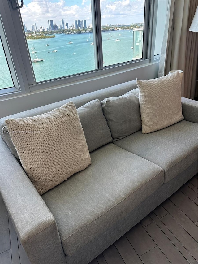 1100 W Ave Unit 1206, Miami Beach, FL 33139 - living room with a skyline view, wood finished floors, and a water view