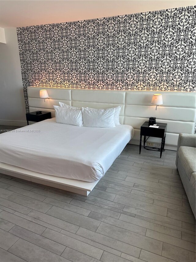 1100 W Ave Unit 1206, Miami Beach, FL 33139 - bedroom featuring wood finished floors