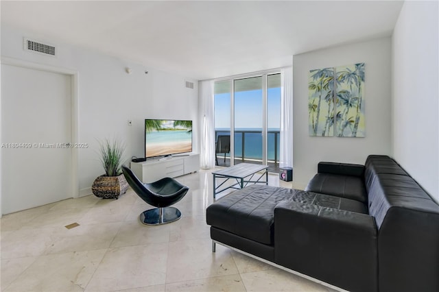 1830 S Ocean Dr Unit 3804, Hallandale Beach, FL 33009 - tiled living room featuring expansive windows